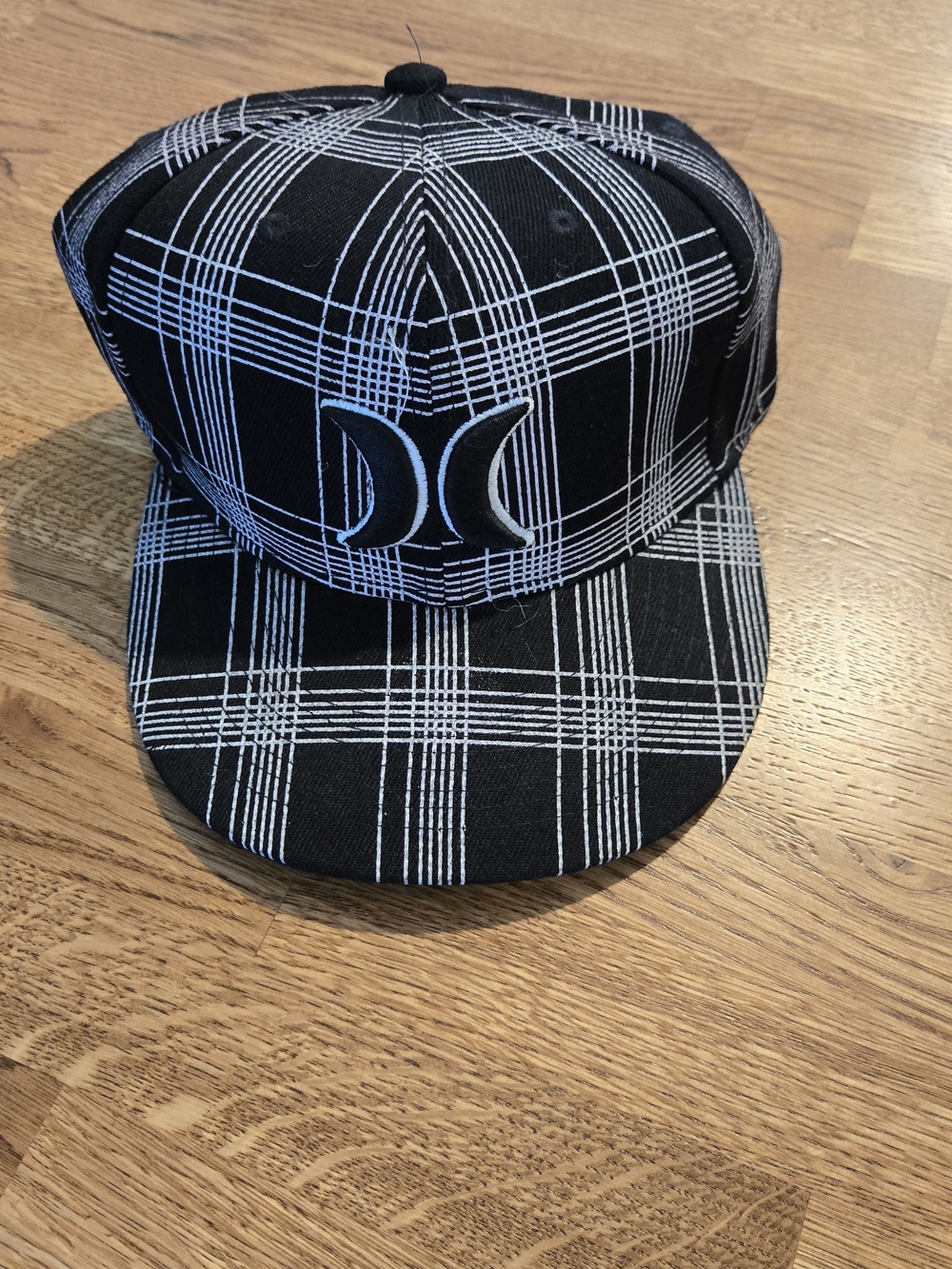 New Era Black Plaid Snapback Hat with White Grid